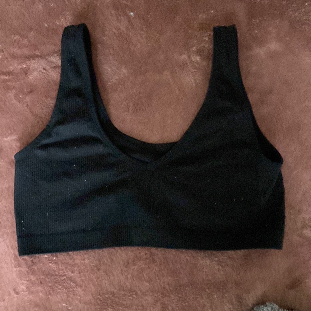 Ribbed, cropped black tank top. awesome basic to have, flattering.